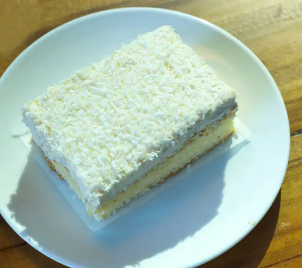 Bolo de coco cremoso de dar água na boca